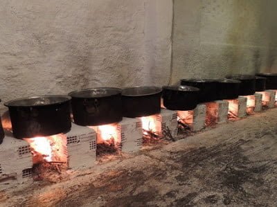 Euboea, Oxilithos Festival - Gastronomy Tours bronze cauldrons with food on the fire at Oxilithos Festival, Euboea, Greece