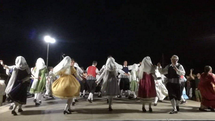 Festival for the Raising of the Holy Cross-Paros, Ageria - Gastronomy Tours Festival for the Raising of the Holy Cross church with people people dancing by night at Paros, Ageria, Greece