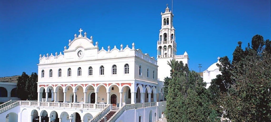 Tinos, Festival of the Discovery of the Holy icon of Virgin Mary - Gastronomy Tours front the church of the Discovery of the Holy icon of Virgin Mary with stairs covered with red carpet at Tinos, Greece and commemorate festival of her birth