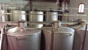 view of the top of aluminum wine storage tanks at 'Foundi Estate' plant