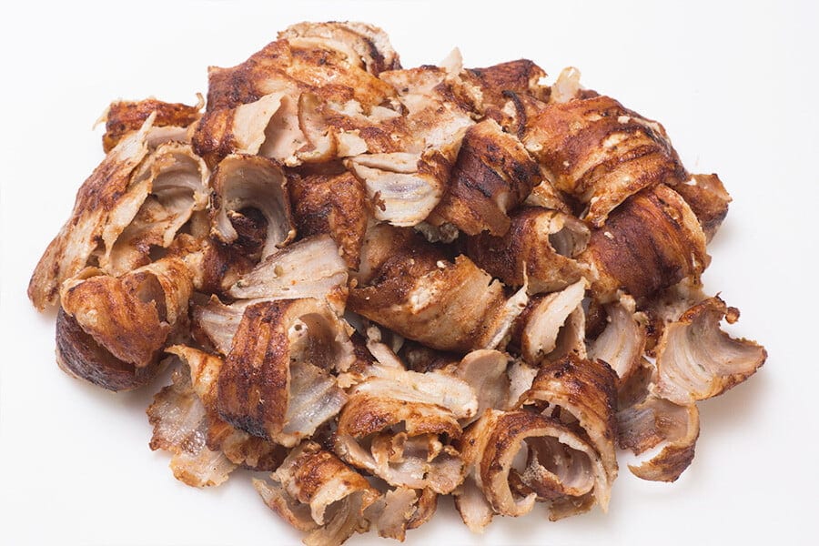 Gyros - Gastronomy Tours Close-up of Greek ‘Gyros’ roasted slices of pork|