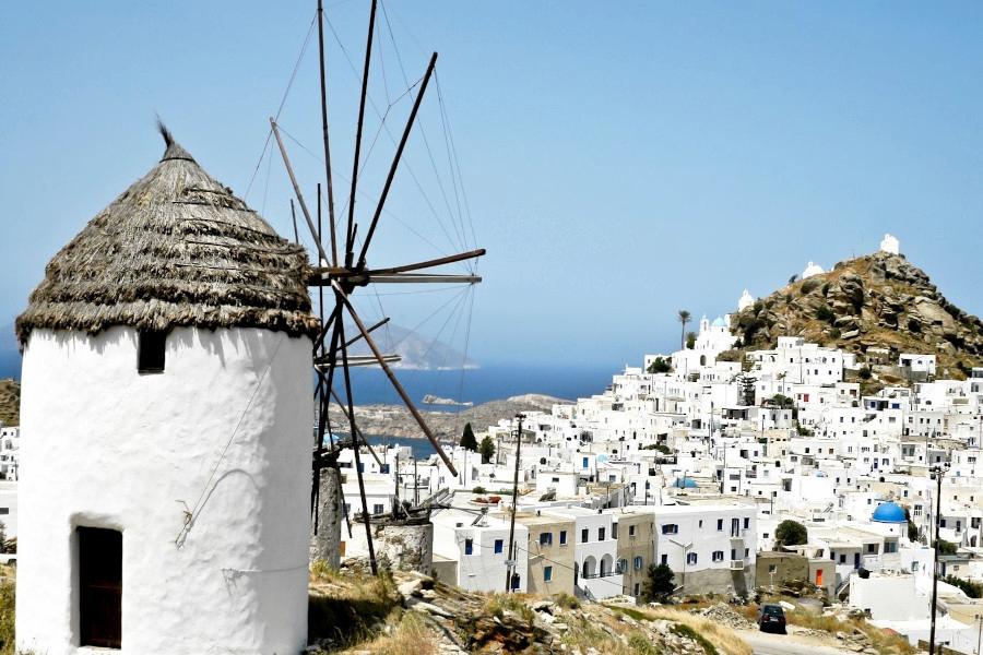 The Best Ios food tours - Gastronomy Tours windmill house and houses and blue sky in the background