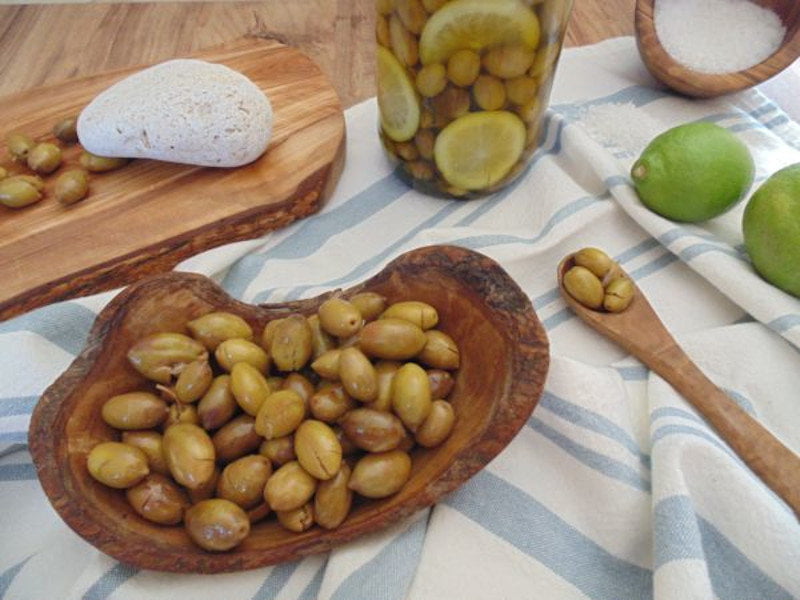 Mouratolia olives - Gastronomy Tours Wooden plateau with Greek ‘Mouratolia olives’