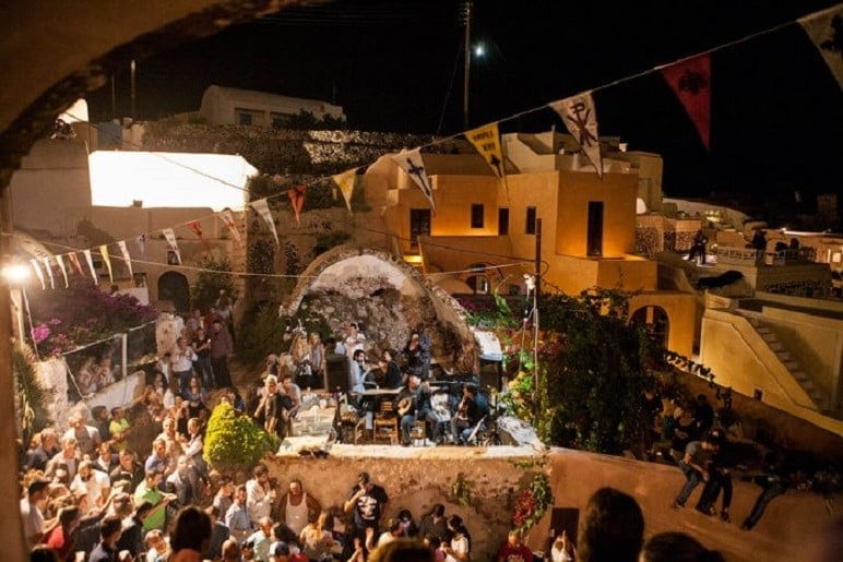 Santorini, Festival Sta. Matrona of Foinikia - Gastronomy Tours church St. Matrona of Foinikia at Santorini by night with peoples on