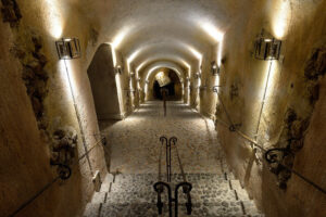 electric candlesticks on the stone walls of 'Koutsoyannopoulos Wine Museum'