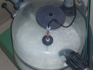 view from above of dairy mixing machine at 'Vasilas Dairy' plant