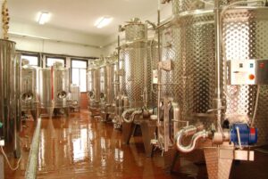 lying aluminum wine storage tanks at 'Dio Fili' plant