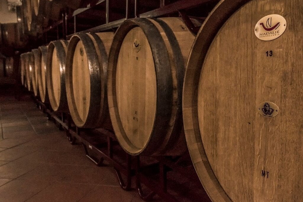 Domaine Bairaktaris Awards - Gastronomy Tours wooden barrels at ‘Domaine Bairaktaris’ cellar that recognized with many awards|