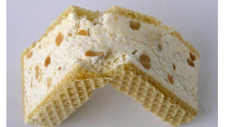 Mandolato - Gastronomy Tours Close-up of ‘mandolato’ or ‘nougat’ with almonds split in two