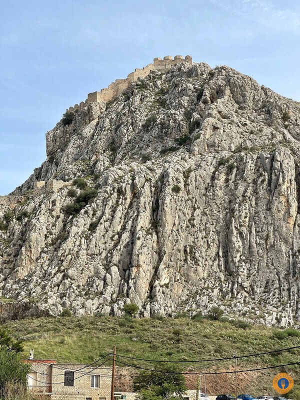 Akrocorinthos, the biggest ancient fortress of the Peloponnese. - Gastronomy Tours a stone mountain with a castle on top