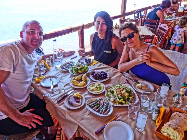Raki - Gastronomy Tours Drinking ouzo