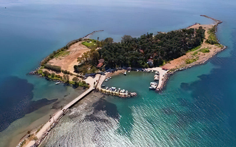 The Best Eretria Food Tours - Gastronomy Tours an island with boats and a dock
