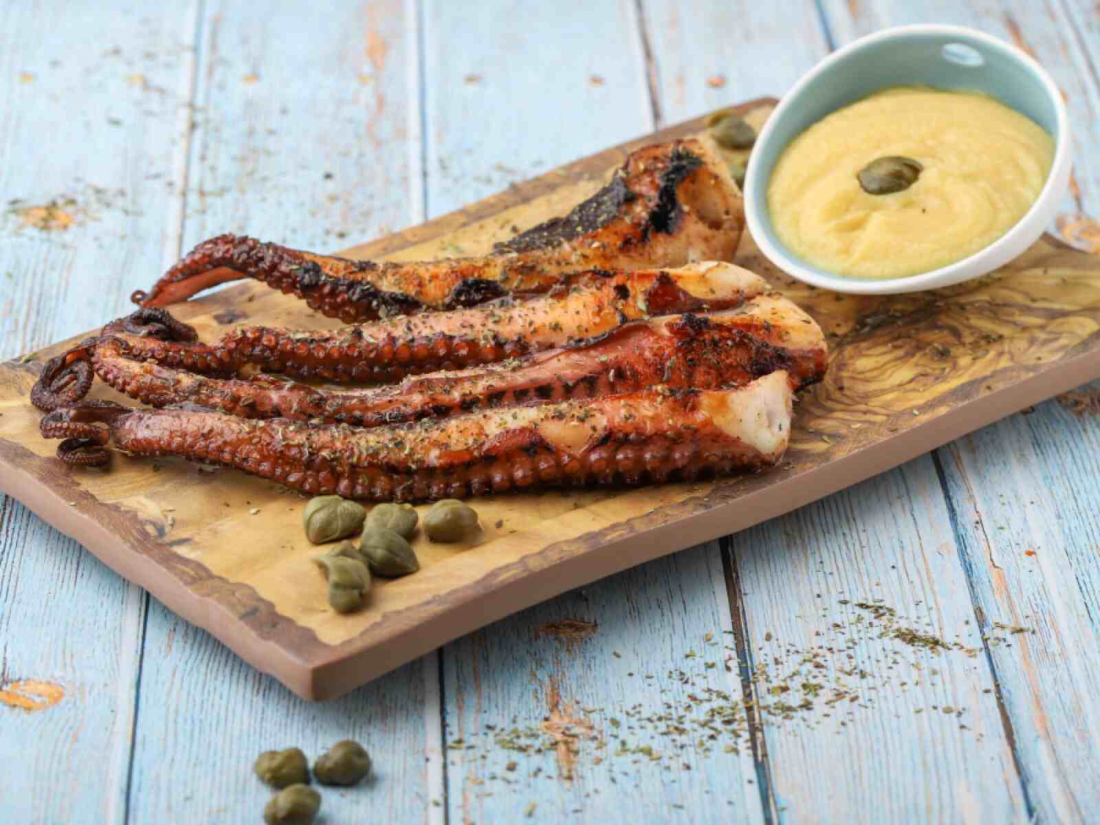 Grilled Octopus in Greece: An Iconic Seafood Dish - Gastronomy Tours Grilled Octopus in Greece: An Iconic Seafood Dish