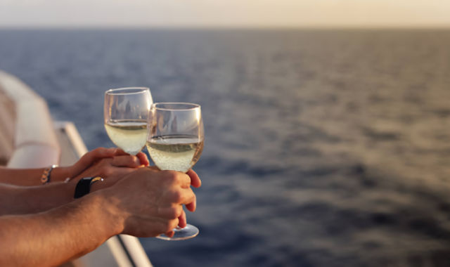 All-Day Boat Trip: Explore Chalkidiki’s Hidden Beaches with Wine in Hand with Panagiotis