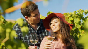 close-up-gorgeous-couple-embracing-each-other-while-holding-glasses-wine-hands_482257-11118.jpg
