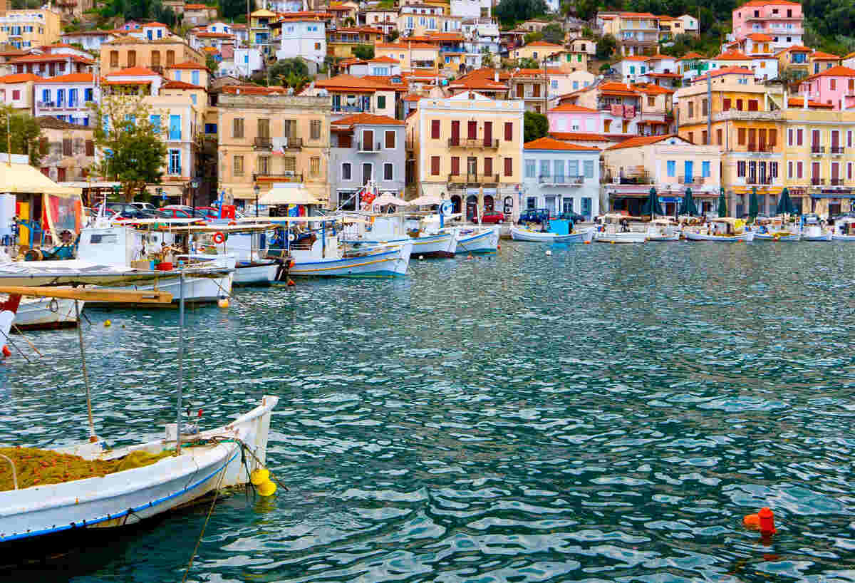 The Best Laconia Food Tours - Gastronomy Tours a group of boats in a harbor
