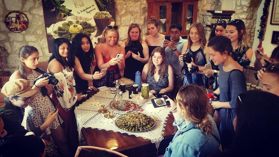 Wrapping Stuffed Vine Leaves, Marianna’s - Gastronomy Tours Wrapping Stuffed Vine Leaves, Marianna’s