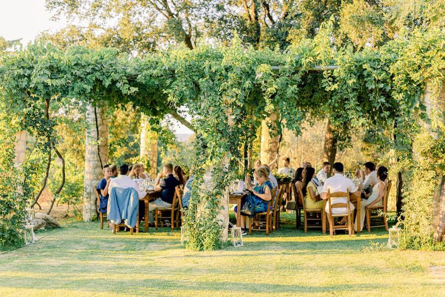 Dourakis Winery - Gastronomy Tours tourists standing and wine tasting.jpg